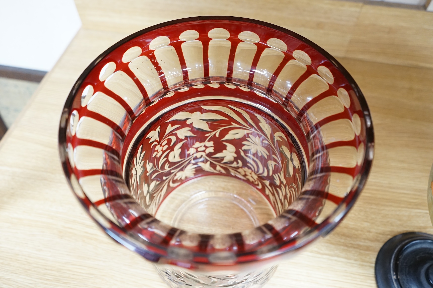 A large early 20th century Bohemian or Czechoslovakian ruby overlaid glass vase, 28cm high